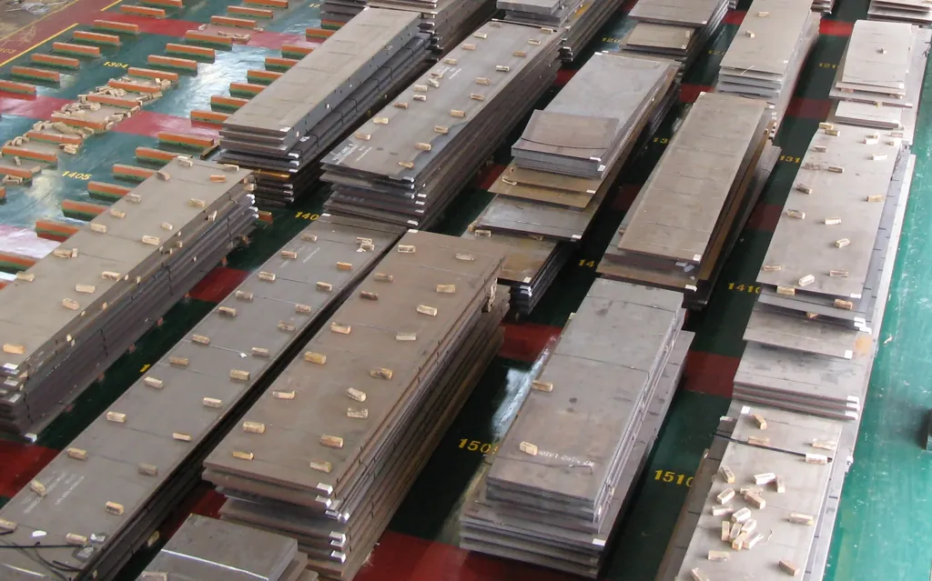 Steel plates stacked in a storage area